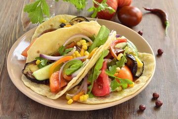 Vegetarian tortilla tacos with grilled vegetables and corn
