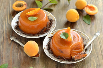 Apricot panna cotta with chocolate shavings and mint