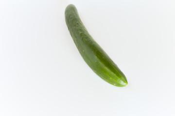 fresh green cucumbers isolated on white background.