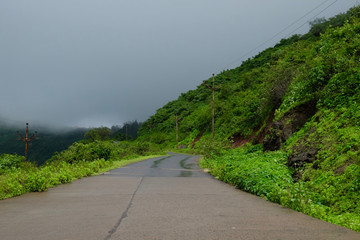 Lush green monsoon nature landscape mountains, hills, Purandar, Pune, Maharashtra, India 