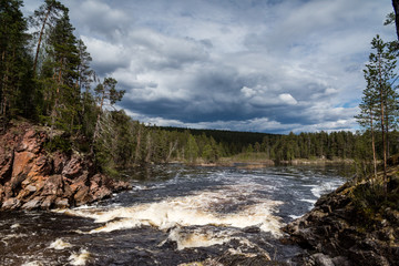 Riverstream in Finland Lapland during Midsummer