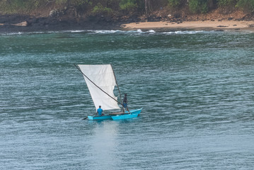 Sao Tome, fishermen who return on the beach on a dugout
