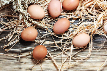 Egg. Fresh farm eggs on a wooden rustic background
