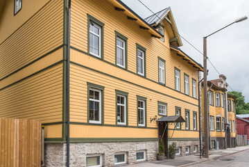 Fototapeta na wymiar Tallinn in Estonia, wooden colorful houses, typical facades 