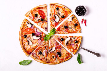 Vegetarian pizza pieces with mushrooms and olives on white background