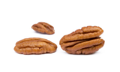Fresh pecan nuts isolated on a white background