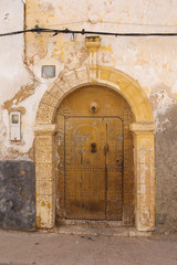 Fototapeta na wymiar Old yellow gate, El Jadida, Morocco