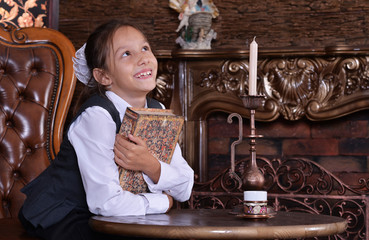 little girl reading book 