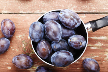 ripe plum space for text