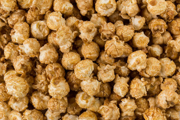 Close-up caramel popcorn, isolated on white background