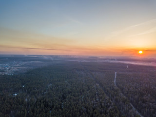 Obraz premium Закат над лесом