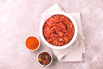 Traditional Maghrebi hot chili pepper sauce paste harissa. adjika