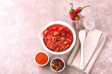 Traditional Maghrebi hot chili pepper sauce paste harissa. adjika