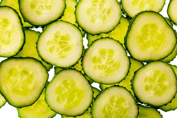 slices of fresh cucumber isolated on white background