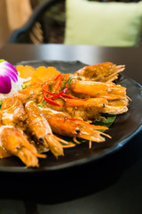 Shrimp in red curry paste with coconut milk, Thai traditional cuisine