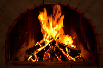 Burning firewood in the fireplace