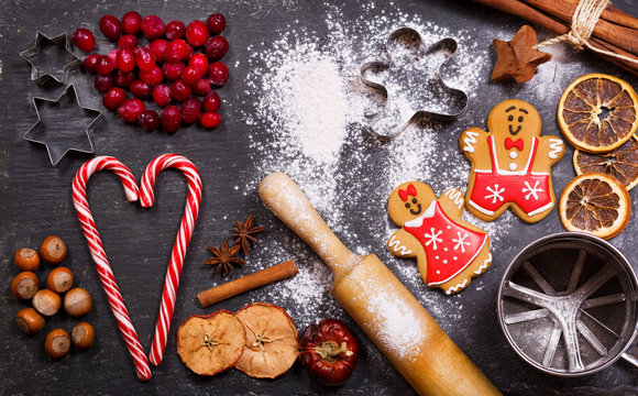 Christmas food. Gingerbread cookies with ingredients for christmas baking