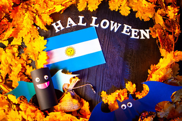 Holiday Halloween. Argentina. Autumn holiday. Vampires against the background of yellow leaves. Decoration for the holiday of Halloween in Argentina. the flag of Argentina.