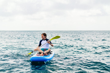 Young man kayaking