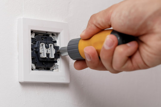 Electrician Installing Light Switch