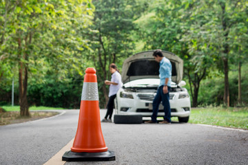 Problematic cars and cones to warn other users.