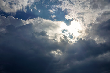 Blue cloudy sky with sunshine