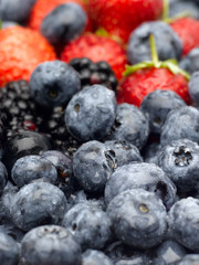 Closeup of fresh berries, blackberries, strawberries and blueberries.