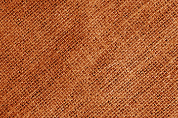 Cotton fabric texture in orange color.