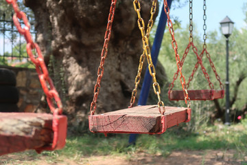 Wooden swing hanging