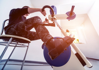 Restoration and rehabilitation of limb movement. Exercise bike and a pedal simulator with an electric motor.