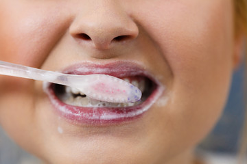Fototapeta premium Woman brushing cleaning teeth