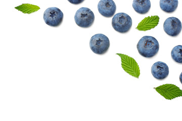 healthy background. blueberries with leaves isolated on white background. top view