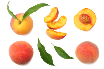 peach fruit with green leaf and slices isolated on white background. top view