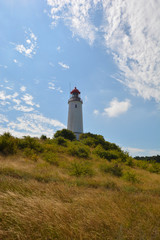 Fototapeta na wymiar Traumhafte Wolken über dem Leuchtturm auf der Insel Hiddensee, Rügen