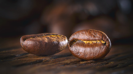 Coffee seeds on grunge wooden background