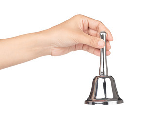 hand holding silver hand bell isolated on a white background.