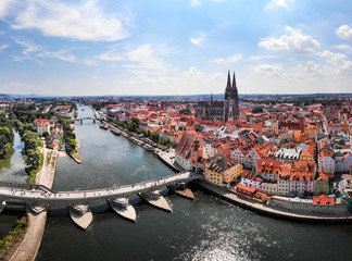 Aerial photography of Regensburg city, Germany. Danube river, architecture, Regensburg Cathedral and Stone Bridge - obrazy, fototapety, plakaty