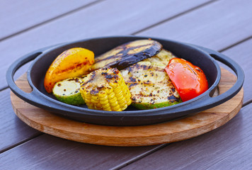 grilled vegetables on iron plate