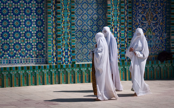 Mazar-e Sharif, Afghanistan, May 2004: Women in burqas at the Blue Mosque in Mazar-e Sharif