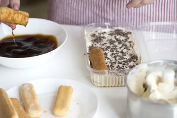 Tiramisu making. process of ice cream-tiramisu preparation.