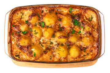 Baked potatoes in a roasting pan. Top view.