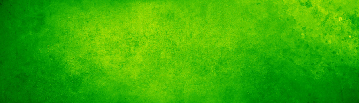 Green textured paper or concrete wall wide banner background