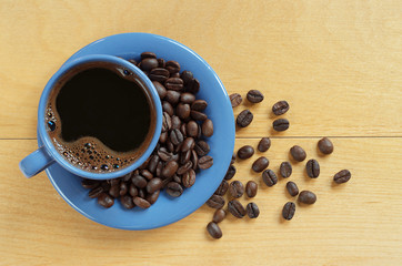 Coffee cup and beans