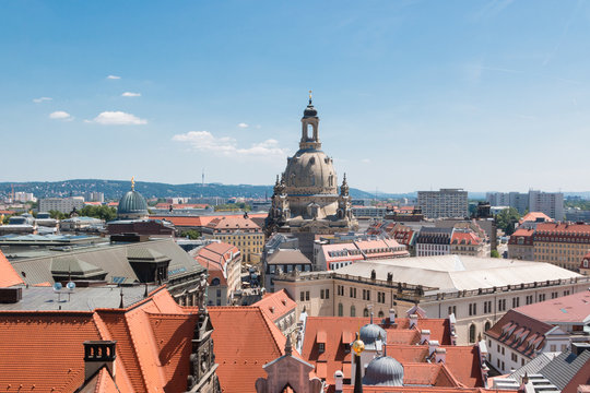 View of one of the most beautiful cities in Europe and Germany - Dresden. Panorama of the old and modern city. The valley of the river Elbe. Tiled roofs and well maintained houses.