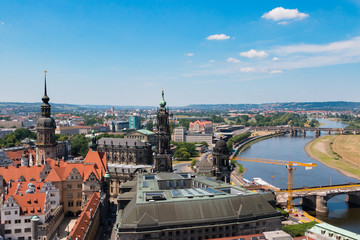 View of one of the most beautiful cities in Europe and Germany - Dresden. Panorama of the old and modern city. The valley of the river Elbe. Tiled roofs and well maintained houses.