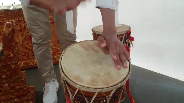 Close Up Of Hands Of A Man Playing A Drum. Indoors.