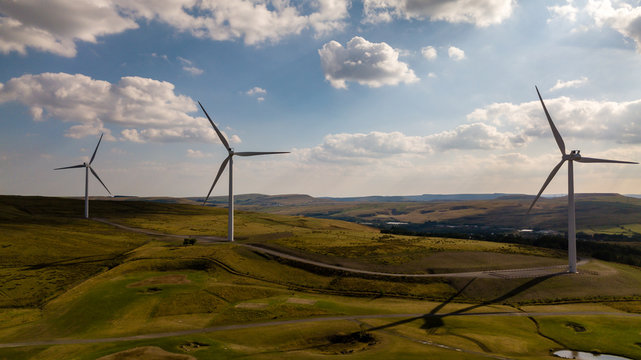 Large wind turbines on a rural hillside in Wales (Tredegar)