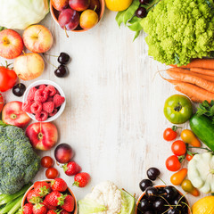 Fresh summer fruits vegetables berries, healthy produce, colorful frame, square copy space, top view, selective focus