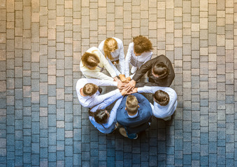 Stack of hands. Unity and teamwork concept.