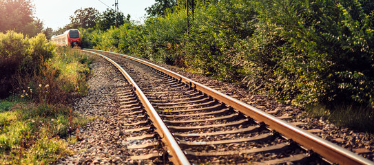 Fototapeta premium Train on a railroad tracks
